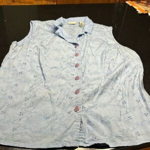 Light blue size large tank top with light embroidery throughout button up